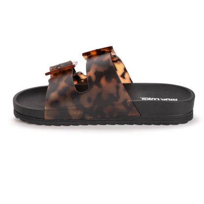 Muk Luks Women's Grand Cayman Lucite Sandal: Black Amber Tortoise / 7