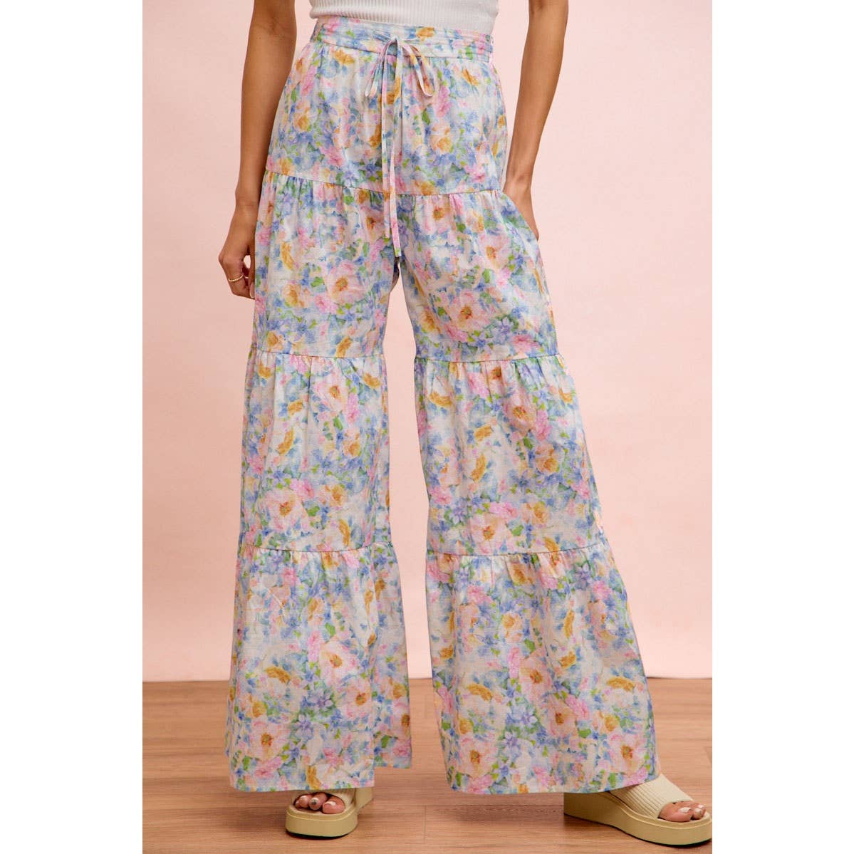 FLORAL PRINTED TIERED FLARE WOVEN PANTS: LT BLUE
